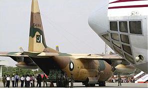 An IL-76 is visible in the foreground